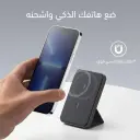 انكر 622 MagGo magnetically attached to a compatible iPhone for wireless charging